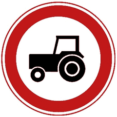 Rond bord met rode rand en een zwarte landbouwtrekker